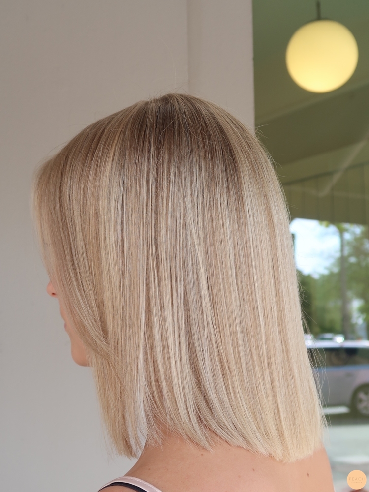 Blond lob slingor blont hår