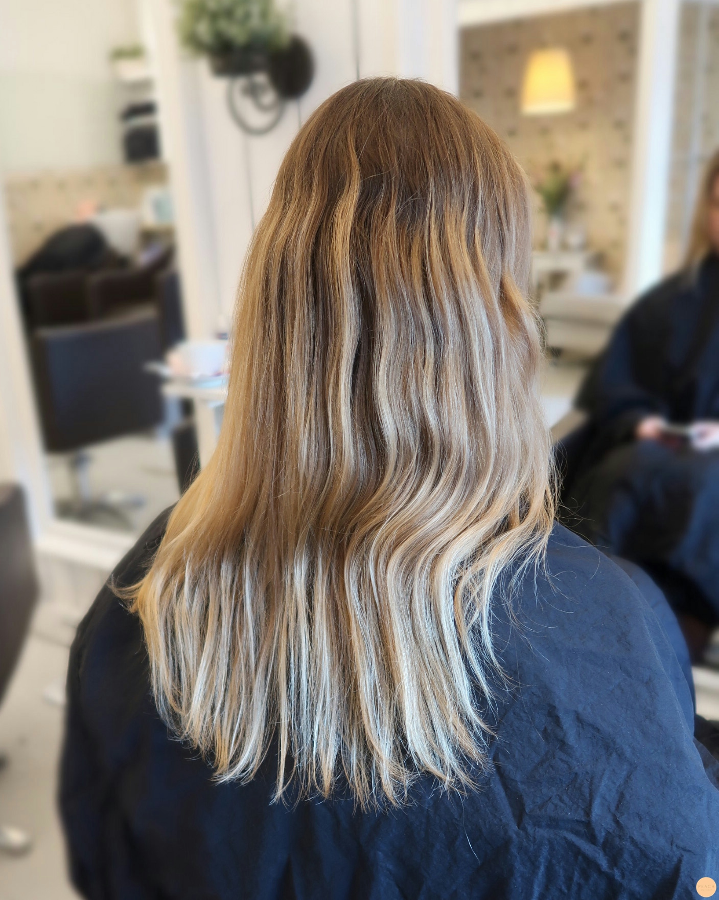 Balayage slingor, en trend som passar många olika hår
