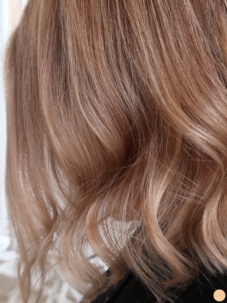 Balayage blonda slingor skiftningar