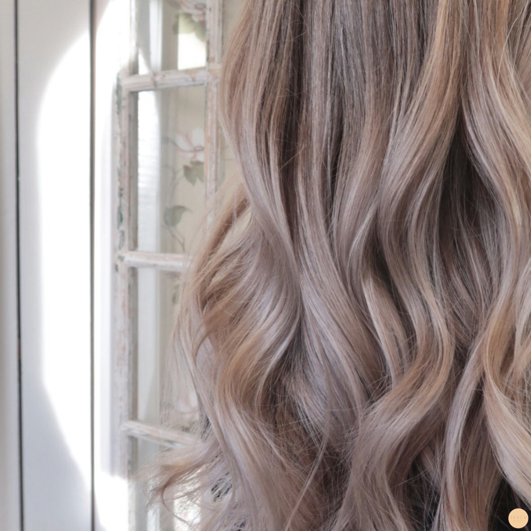 Lyxig blond balayage med highlights och lowlights